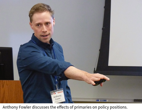 Anthony Fowler speaks in a classroom