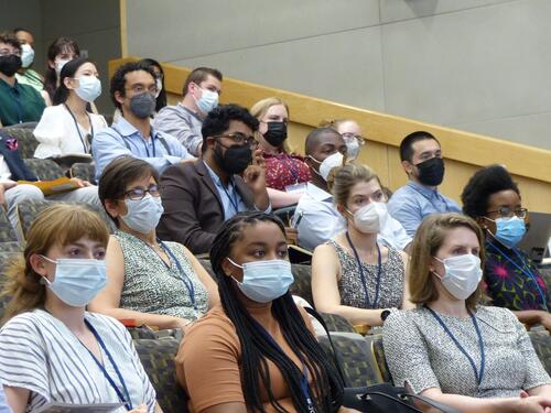 Attendees seated at the conference