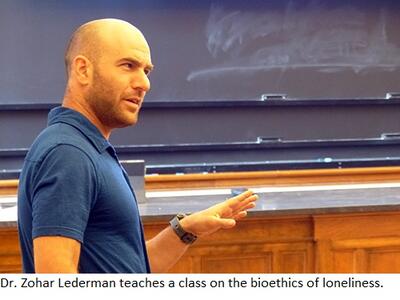 Zohar Lederman speaks in a classroom