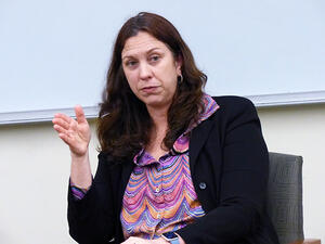 Colleen Shogan speaks while seated in a classroom