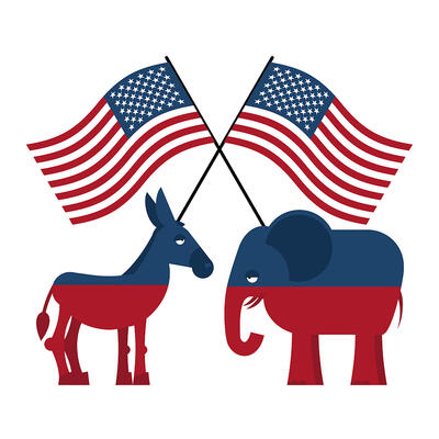 An Elephant and a Donkey face each other in front of American flags