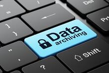 image of computer key labeled "Data archiving"