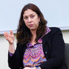 Colleen Shogan speaks while seated in a classroom