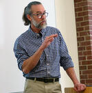 Gregory Kaebnick speaks in a classroom